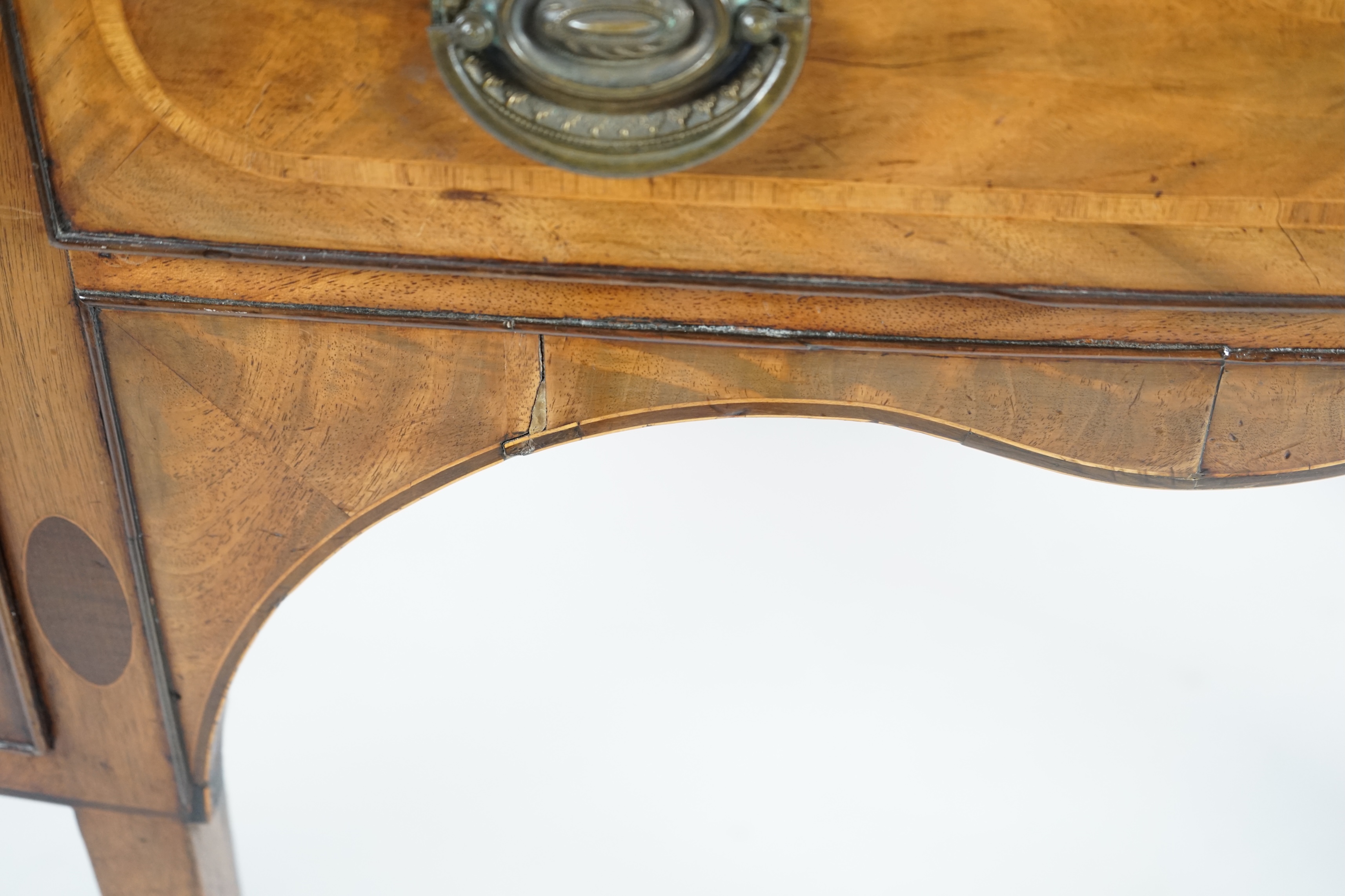 A George III rosewood banded mahogany bowfront sideboard